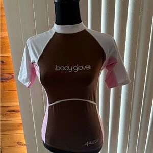 Body Glove swim top. Brown and White and pink. Never worn like new